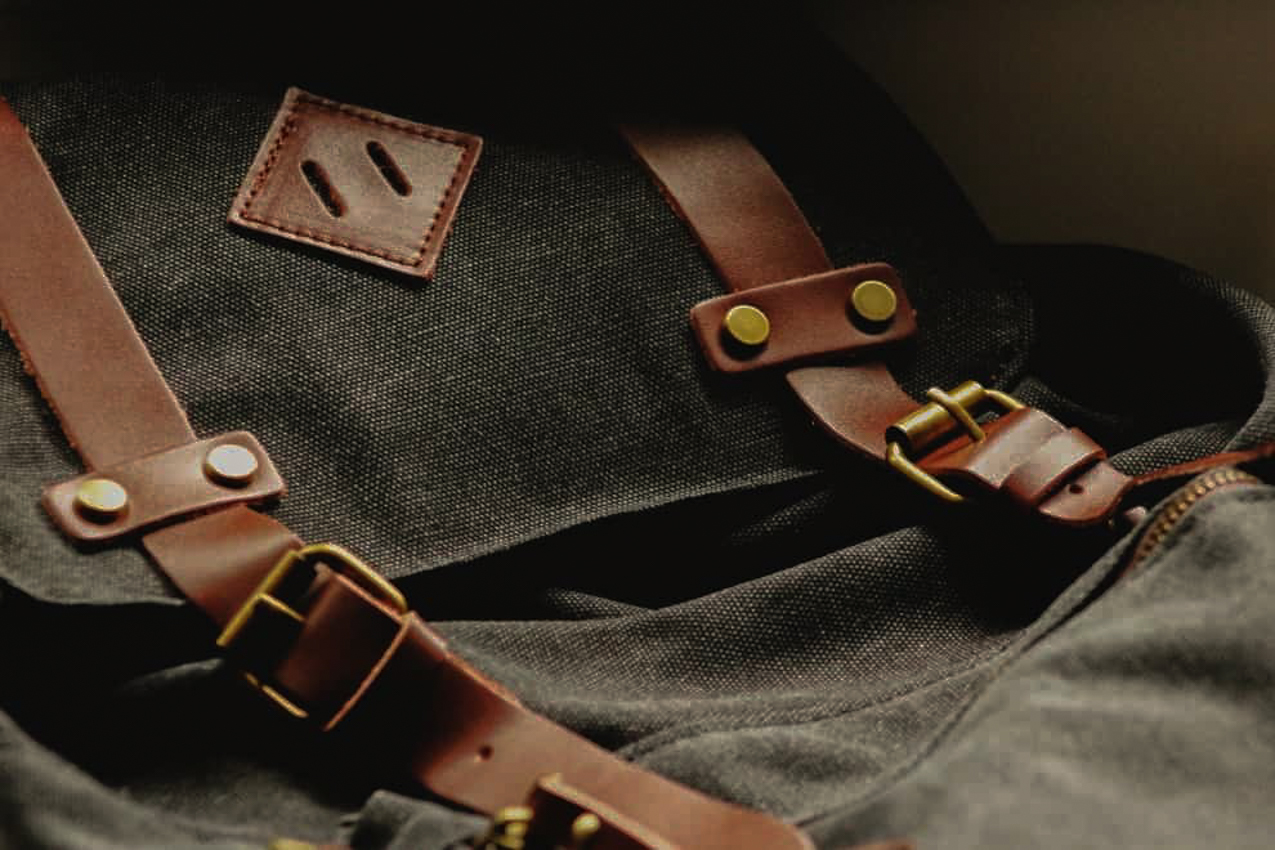 Cast single roller buckles and brown leather strap.