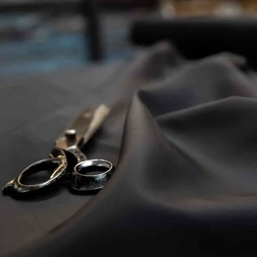 Nylon lining draped on table, textiel wholesaler